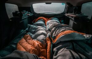 Two people enjoying car camping meals