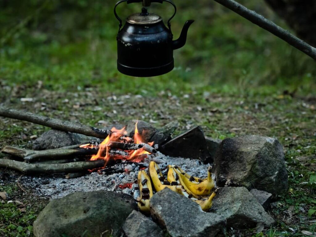Campfire banana boats being cooked